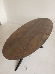 oval oak dining room table